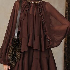 Elegant Brown Ruffled Dress with Cape